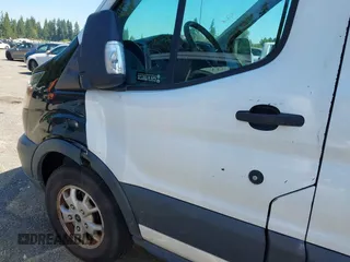 2015 Ford Transit Cargo z VIN 1FTYR2CM4FKA84548, wystawiony jako IAAI lot #42561069 z przebiegiem 174 469 mil mil oraz . Historia ofert i sprzedaży dostępna na DreamBid. Obrazek 6.