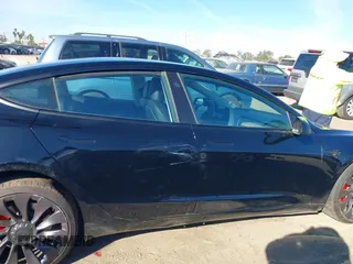 2021 Tesla Model 3 Performance with VIN 5YJ3E1EC6MF999321, listed as a IAAI auction lot 41417451 with 20,562 mi miles and . Bid and sale history available at carsss.com. Image 13.