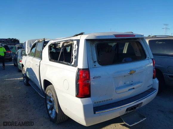 2019 Chevrolet Suburban Premier with VIN 1GNSCJKC0KR293658, listed as a IAAI auction lot 40563834 with 153,619 mi miles. Bid and sale history available at carsss.com. Image 6.