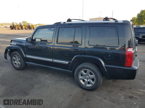 2008 Jeep Commander Limited with VIN 1J8HH58N98C236772, listed as a Copart auction lot 71042404 with 217,780 mi miles and Salvage title. Bid and sale history available at DreamBid. Image 2.