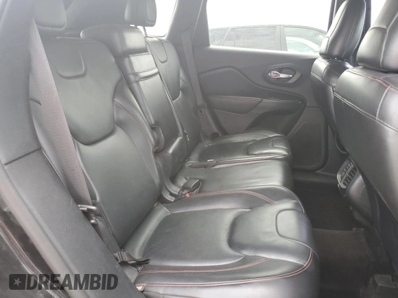 2016 Jeep Cherokee Trailhawk z VIN 1C4PJMBB8GW203534, wystawiony jako Copart lot #54403945 z przebiegiem 168 080 mil mil oraz Szkoda całkowita • Salvage title. Historia ofert i sprzedaży dostępna na DreamBid. Obrazek 11.