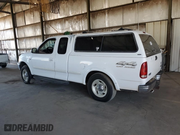 1998 Ford F-150 с VIN 1FTRX18L0WKA53124, выставлен на аукционе Copart как лот 66466945 с пробегом 252 908 миль миль и Чистый • Clean title. История ставок и продаж доступна на DreamBid. Изображение 2.