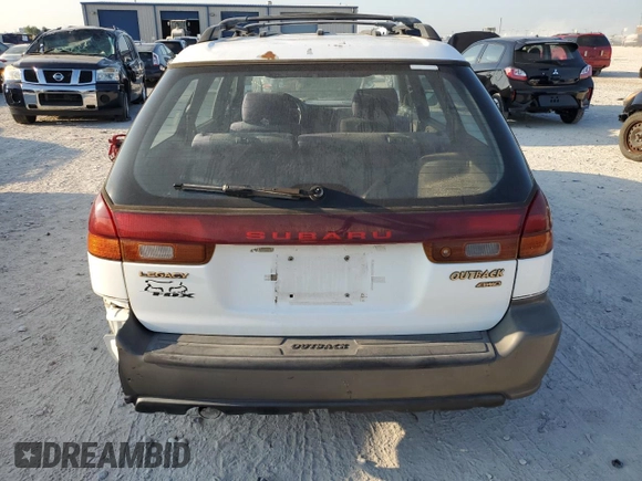 1996 Subaru Legacy Outback with VIN 4S3BG6857T7386841, listed as a Copart auction lot 70968724 with 122,232 mi miles and Salvage title. Bid and sale history available at DreamBid. Image 6.