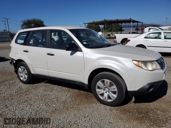 2010 Subaru Forester X with VIN JF2SH6AC0AH743775, listed as a Copart auction lot 60884835 with 127,481 mi miles and Salvage title. Bid and sale history available at DreamBid. Image 4.