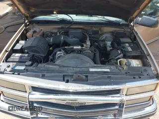 1999 Chevrolet Suburban with VIN 1GNFK16RXXJ416360, listed as a IAAI auction lot 42670294 with 319,691 mi miles and . Bid and sale history available at DreamBid. Image 10.