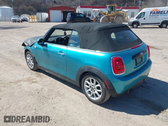 2016 MINI Convertible z VIN WMWWG5C53G3C18842, wystawiony jako IAAI lot #41864596 z przebiegiem 91 253 mil mil oraz . Historia ofert i sprzedaży dostępna na DreamBid. Obrazek 3.