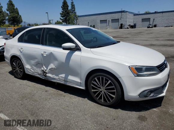 2012 Volkswagen Jetta SEL with VIN 3VWLP7AJ5CM424796, listed as a Copart auction lot 62376005 with 173,505 mi miles and Salvage title. Bid and sale history available at DreamBid. Image 4.