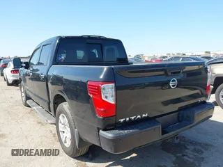 2017 Nissan Titan SV with VIN 1N6AA1E68HN535917, listed as a IAAI auction lot 41974261 with 162,561 mi miles and . Bid and sale history available at DreamBid. Image 3.