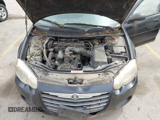 2005 Chrysler Sebring with VIN 1C3EL46X65N581673, listed as a IAAI auction lot 42204748 with 165,392 mi miles and . Bid and sale history available at DreamBid. Image 10.