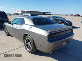 2012 Dodge Challenger SXT Plus with VIN 2C3CDYAG1CH262352, listed as a IAAI auction lot 41662002 with 141,868 mi miles. Bid and sale history available at carsss.com. Image 3.