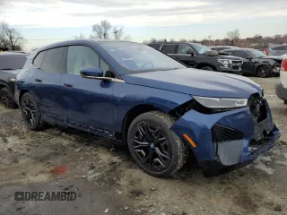 2023 BMW iX M60 with VIN WB533CF01PCM75951, listed as a Copart auction lot 42005405 with 13,540 mi miles and Salvage Title. Bid and sale history available at carsss.com. Image 4.