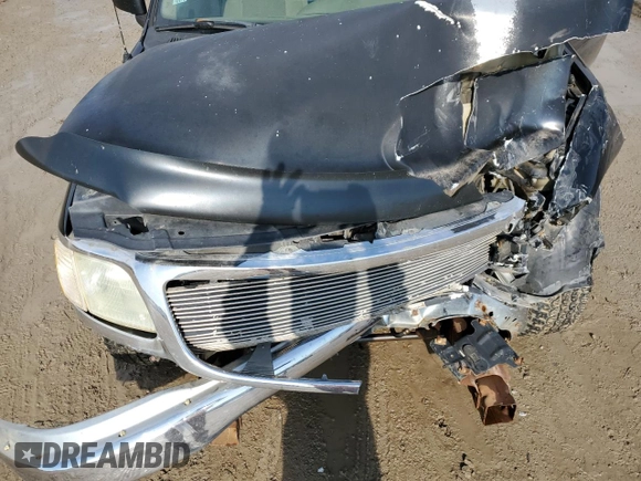 2001 Ford F-150 XL z VIN 1FTZF17261NB79183, wystawiony jako Copart lot #88478625 z przebiegiem Nie podano mil oraz Szkoda całkowita • Salvage title. Historia ofert i sprzedaży dostępna na DreamBid. Obrazek 11.