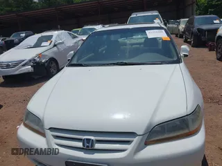 2002 Honda Accord EX z VIN 1HGCG16592A037760, wystawiony jako IAAI lot #42334100 z przebiegiem 271 805 mil mil oraz . Historia ofert i sprzedaży dostępna na DreamBid. Obrazek 6.