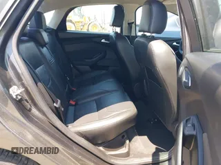 2016 Ford Focus SE z VIN 1FADP3F25GL329217, wystawiony jako IAAI lot #42461772 z przebiegiem 85 070 mil mil oraz . Historia ofert i sprzedaży dostępna na DreamBid. Obrazek 8.
