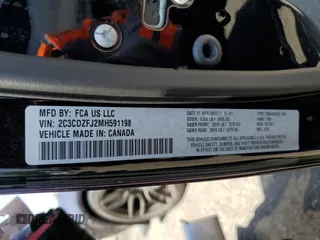 2021 Dodge Challenger R/T Scat Pack z VIN 2C3CDZFJ2MH591198, wystawiony jako Copart lot #54049505 z przebiegiem 50 282 mil mil oraz Szkoda całkowita • Salvage title. Historia ofert i sprzedaży dostępna na DreamBid. Obrazek 12.