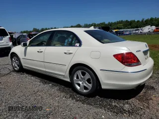 2006 Acura RL z VIN JH4KB16576C012132, wystawiony jako Copart lot #61897805 z przebiegiem 143 101 mil mil oraz Szkoda całkowita • Salvage title. Historia ofert i sprzedaży dostępna na DreamBid. Obrazek 2.