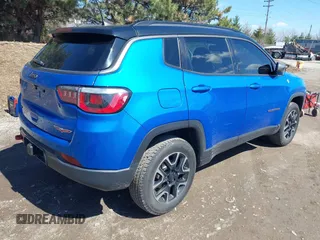 2019 Jeep Compass Trailhawk with VIN 3C4NJDDB5KT683907, listed as a IAAI auction lot 41876584 with 54,685 mi miles and . Bid and sale history available at DreamBid. Image 4.