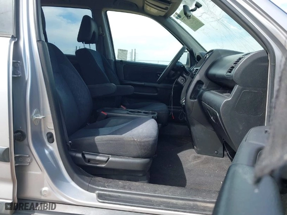 2005 Honda CR-V LX with VIN JHLRD68565C015724, listed as a IAAI auction lot 42021737 with 207,142 mi miles. Bid and sale history available at carsss.com. Image 5.
