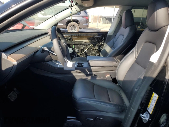 2023 Tesla Model Y Long Range with VIN 7SAYGDEE5PF834645, listed as a Copart auction lot 48596925 with 26,896 mi miles and Salvage Title. Bid and sale history available at DreamBid. Image 7.