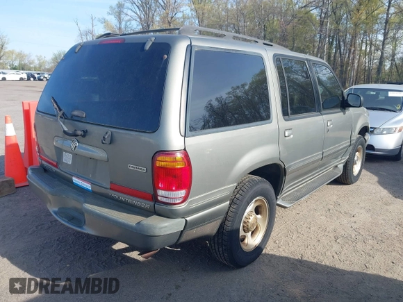 2000 Mercury Mountaineer with VIN 4M2DU86P7YUJ11166, listed as a IAAI auction lot 42077531 with 167,191 mi miles and . Bid and sale history available at DreamBid. Image 4.