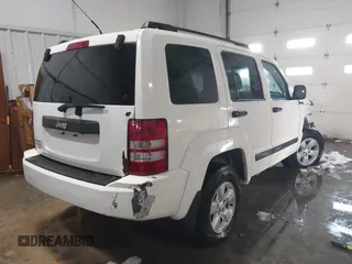 2010 Jeep Liberty Sport with VIN 1J4PN2GK4AW182488, listed as a IAAI auction lot 41312146 with 217,617 mi miles. Bid and sale history available at carsss.com. Image 4.
