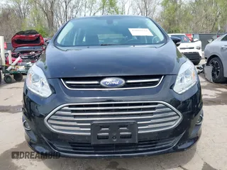 2017 Ford C-Max Energi Titanium with VIN 1FADP5FU2HL115199, listed as a IAAI auction lot 42001944 with 57,609 mi miles. Bid and sale history available at carsss.com. Image 12.