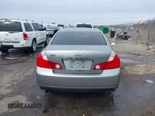 2007 Infiniti M Sport z VIN JNKAY01E47M308944, wystawiony jako IAAI lot #41514395 z przebiegiem 166 936 mil mil oraz . Historia ofert i sprzedaży dostępna na DreamBid. Obrazek 16.
