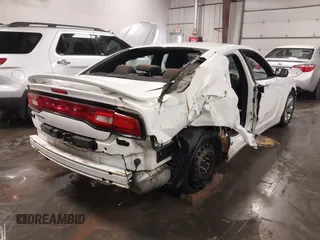 2013 Dodge Charger SE with VIN 2C3CDXBG2DH726467, listed as a IAAI auction lot 38024398 with 232,387 mi miles and . Bid and sale history available at carsss.com. Image 6.