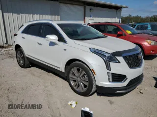 2023 Cadillac XT5 FWD Premium Luxury with VIN 1GYKNCRS9PZ224013, listed as a Copart auction lot 44164135 with 12,003 mi miles and Salvage Title. Bid and sale history available at carsss.com. Image 4.