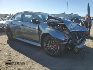 2015 Mitsubishi Lancer Evolution Final Edition with VIN JA32W7FV0FU027962, listed as a Copart auction lot 85763774 with 56,671 mi miles and Salvage Title. Bid and sale history available at carsss.com. Image 4.
