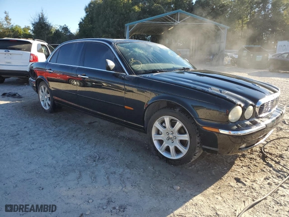 2005 Jaguar XJ VDP with VIN SAJWA82C05SG47513, listed as a Copart auction lot 75428654 with NaN miles and Salvage Title. Bid and sale history available at carsss.com. Image 4.