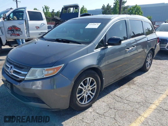2011 Honda Odyssey EX-L with VIN 5FNRL5H64BB070836, listed as a IAAI auction lot 42520878 with 162,316 mi miles and . Bid and sale history available at DreamBid. Image 17.
