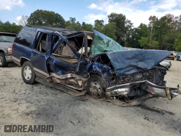 1998 GMC Yukon with VIN 1GKEK13R8WJ722890, listed as a Copart auction lot 72904114 with 243,711 mi miles and Salvage Title. Bid and sale history available at carsss.com. Image 4.