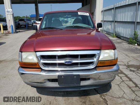 1999 Ford Ranger XL with VIN 1FTYR14V2XPB56627, listed as a Copart auction lot 57036435 with 215,050 mi miles and Salvage title. Bid and sale history available at DreamBid. Image 5.
