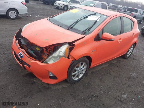 2013 Toyota Prius c One with VIN JTDKDTB35D1051287, listed as a IAAI auction lot 41678057 with 148,214 mi miles. Bid and sale history available at carsss.com. Image 2.