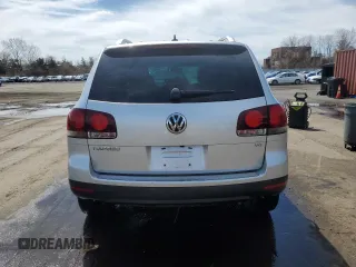2010 Volkswagen Touareg VR6 with VIN WVGBF7A97AD004355, listed as a Copart auction lot 52861335 with 129,454 mi miles and Salvage Title. Bid and sale history available at DreamBid. Image 6.