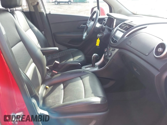 2016 Chevrolet Trax LTZ with VIN KL7CJRSBXGB572279, listed as a IAAI auction lot 41866351 with 97,363 mi miles. Bid and sale history available at carsss.com. Image 5.