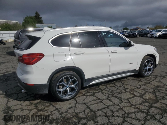 2017 BMW X1 sDrive28i with VIN WBXHU7C33H5H32827, listed as a Copart auction lot 50348265 with 117,412 mi miles and Salvage Title. Bid and sale history available at carsss.com. Image 3.