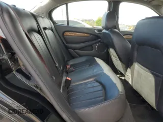 2004 Jaguar X-Type with VIN SAJEA51C74WD56736, listed as a Copart auction lot 48038295 with 115,817 mi miles and Salvage Title. Bid and sale history available at DreamBid. Image 10.