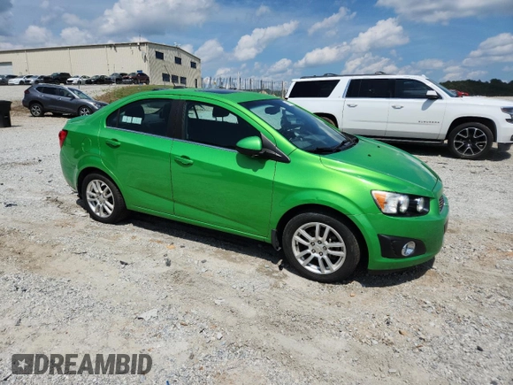 2015 Chevrolet Sonic LT z VIN 1G1JC5SH2F4145840, wystawiony jako Copart lot #59638075 z przebiegiem 101 521 mil mil oraz Czysty tytuł • Clean title. Historia ofert i sprzedaży dostępna na DreamBid. Obrazek 4.