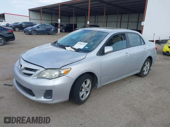 2011 Toyota Corolla L with VIN 2T1BU4EEXBC571707, listed as a IAAI auction lot 41884755 with 200,210 mi miles. Bid and sale history available at carsss.com. Image 2.