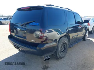 2007 Chevrolet Tahoe LTZ with VIN 1GNFC13J67R245233, listed as a IAAI auction lot 41726159 with 203,841 mi miles and . Bid and sale history available at DreamBid. Image 4.