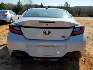 2023 Toyota GR86 with VIN JF1ZNBC12P8764801, listed as a Copart auction lot 46534655 with 23,498 mi miles and Salvage Title. Bid and sale history available at carsss.com. Image 6.