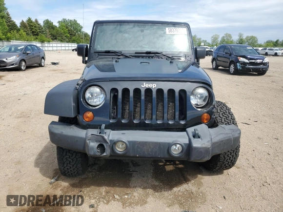 2011 Jeep Wrangler Unlimited Rubicon with VIN 1J4BA6H16BL561658, listed as a Copart auction lot 58379755 with 103,587 mi miles and Salvage title. Bid and sale history available at DreamBid. Image 5.