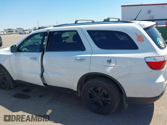 2013 Dodge Durango Crew with VIN 1C4RDJDG8DC664544, listed as a IAAI auction lot 42608957 with 202,564 mi miles and . Bid and sale history available at DreamBid. Image 14.