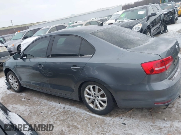 2015 Volkswagen Jetta Sport with VIN 3VWD17AJ6FM319596, listed as a IAAI auction lot 41370591 with 92,818 mi miles and . Bid and sale history available at DreamBid. Image 14.
