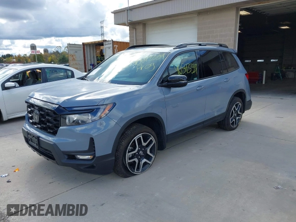 2023 Honda Passport Elite with VIN 5FNYF8H03PB000039, listed as a IAAI auction lot 40593339 with 33,697 mi miles and . Bid and sale history available at DreamBid. Image 17.
