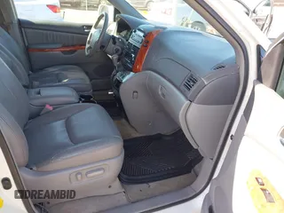 2010 Toyota Sienna XLE with VIN 5TDYK4CC3AS336590, listed as a IAAI auction lot 41798194 with 230,707 mi miles. Bid and sale history available at carsss.com. Image 5.