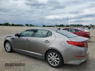 2015 Kia Optima EX with VIN 5XXGN4A75FG456554, listed as a Copart auction lot 58704005 with 114,146 mi miles and Salvage title. Bid and sale history available at DreamBid. Image 2.