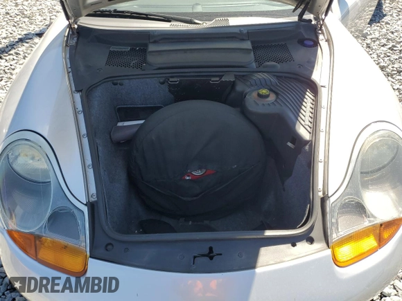 1998 Porsche Boxster z VIN WP0CA298XWU622217, wystawiony jako Copart lot #49441925 z przebiegiem 120 638 mil mil oraz Szkoda całkowita • Salvage title. Historia ofert i sprzedaży dostępna na DreamBid. Obrazek 11.